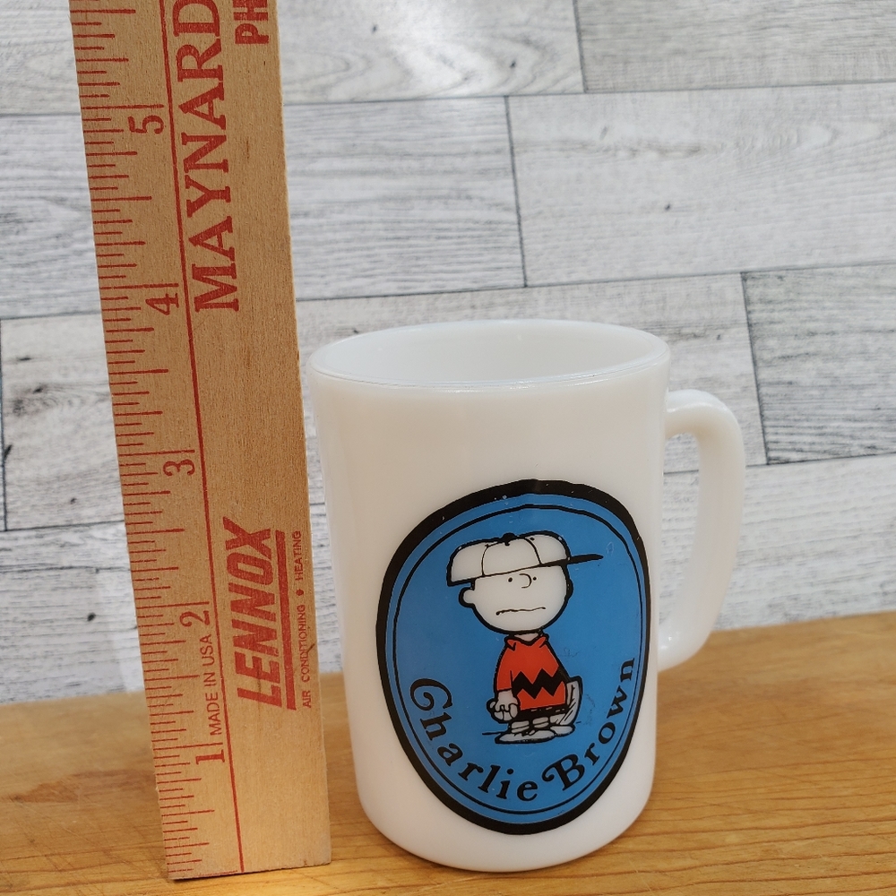 Charlie Brown milk glass cup.